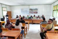 Prosesi Serah Terima Perbaikan MTs Obi Maharai di Desa Gambaru. 